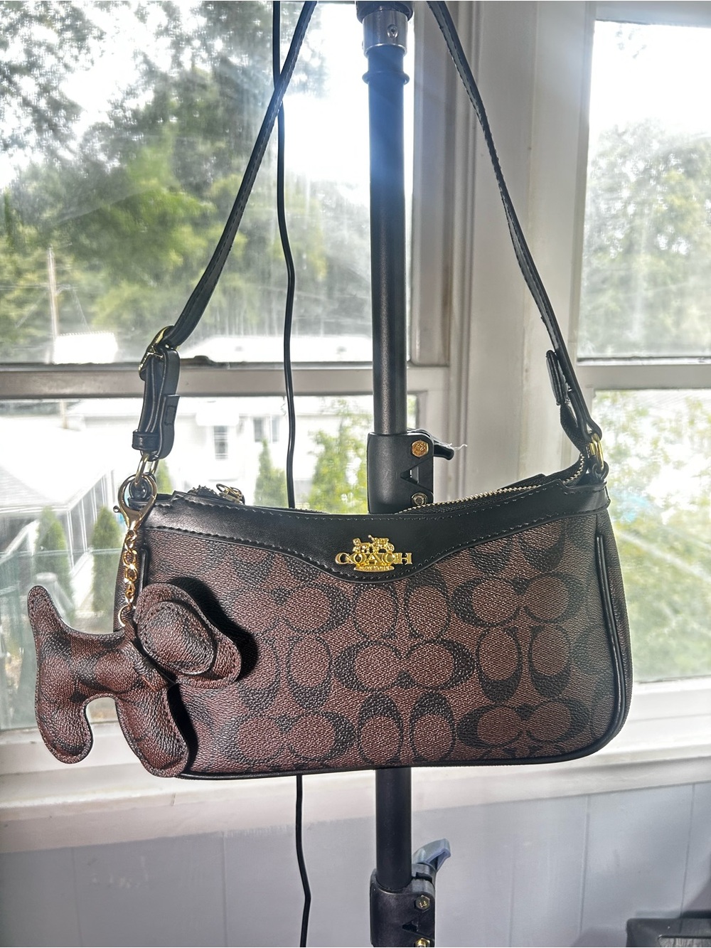 Coach Mini Shoulder Bag in Brown Signature leather with dog charm